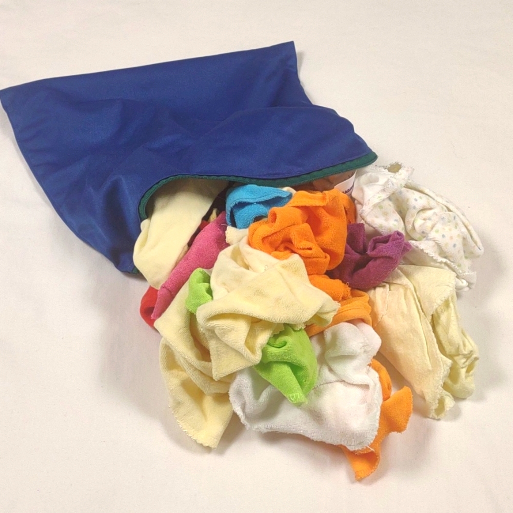 Wet bag with various brands of washable/reusable baby wipes